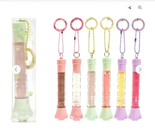 [6976289197516] KEVIN Y COCO LIP OIL LLAVERO HUELLA